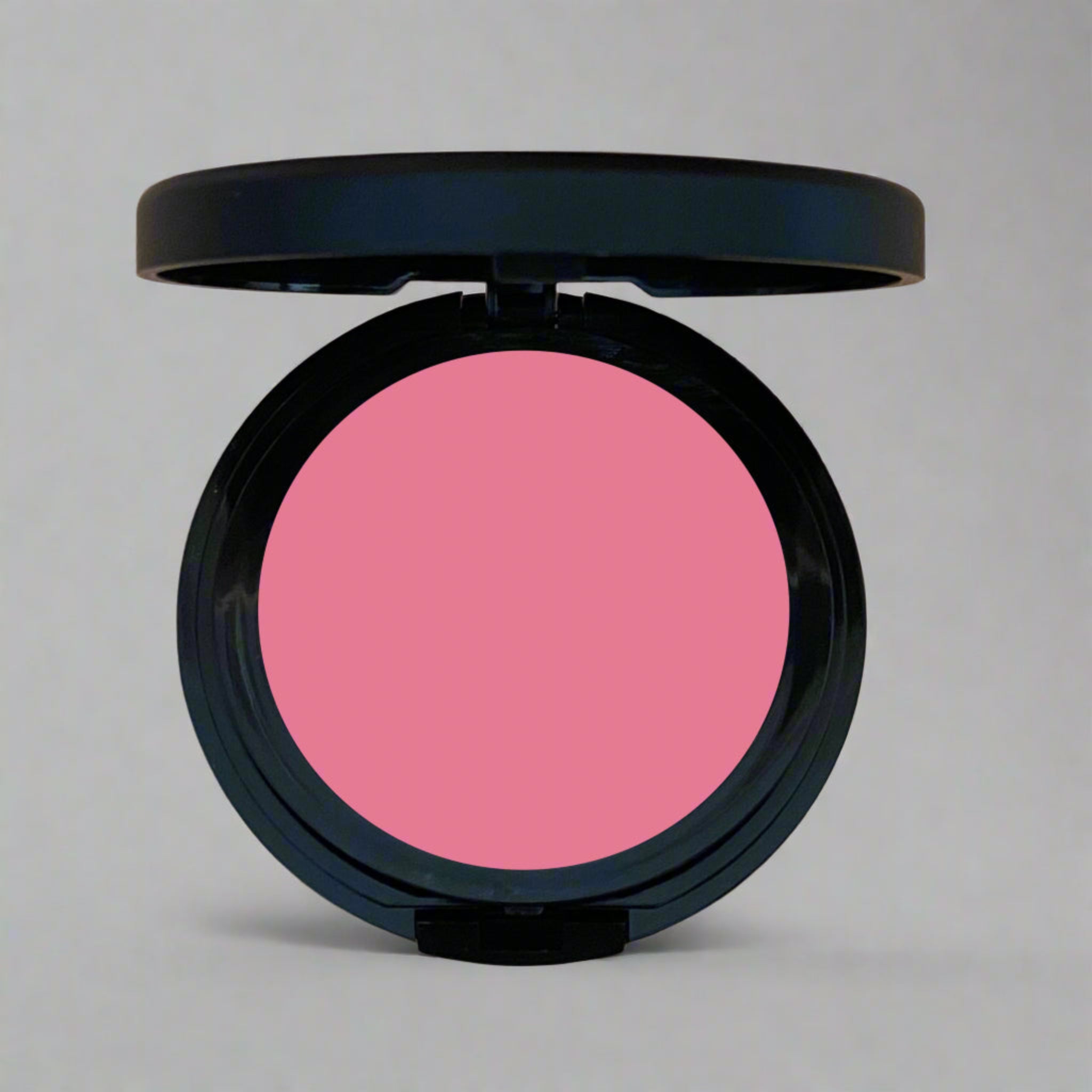 Dozen Roses Dusty Rose Pressed Blush, a soft pink shade designed to enhance natural beauty with a radiant glow. Part of our mindful beauty collection, crafted with care and toxin-free ingredients for a sustainable and empowering choice.