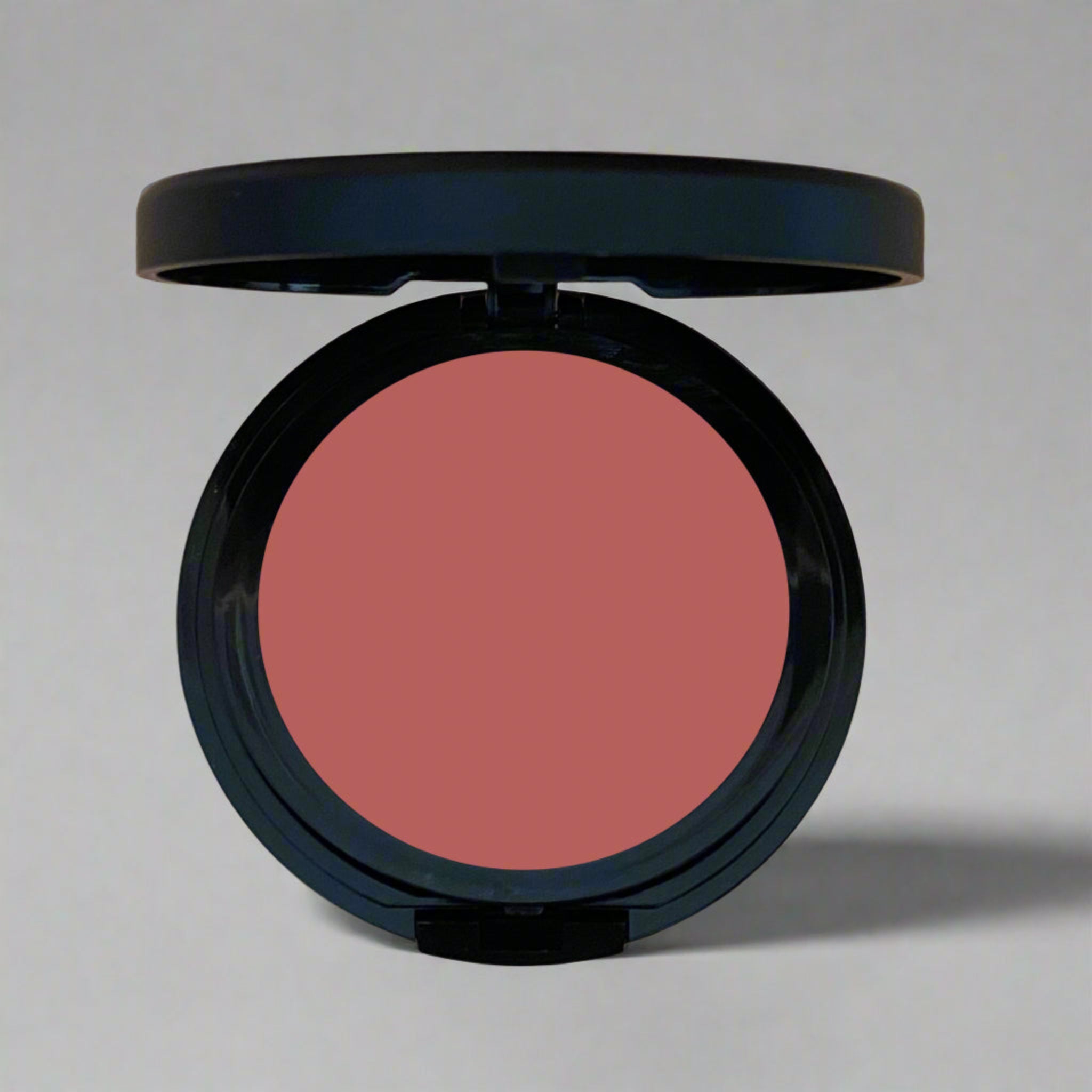 Mojave Matte Blush, a dark reddish brown shade inspired by desert landscapes, designed to enhance natural beauty with subtle highlighting and contouring. Crafted with purity and mindful beauty in focus, this blush offers a radiant and earthy finish.