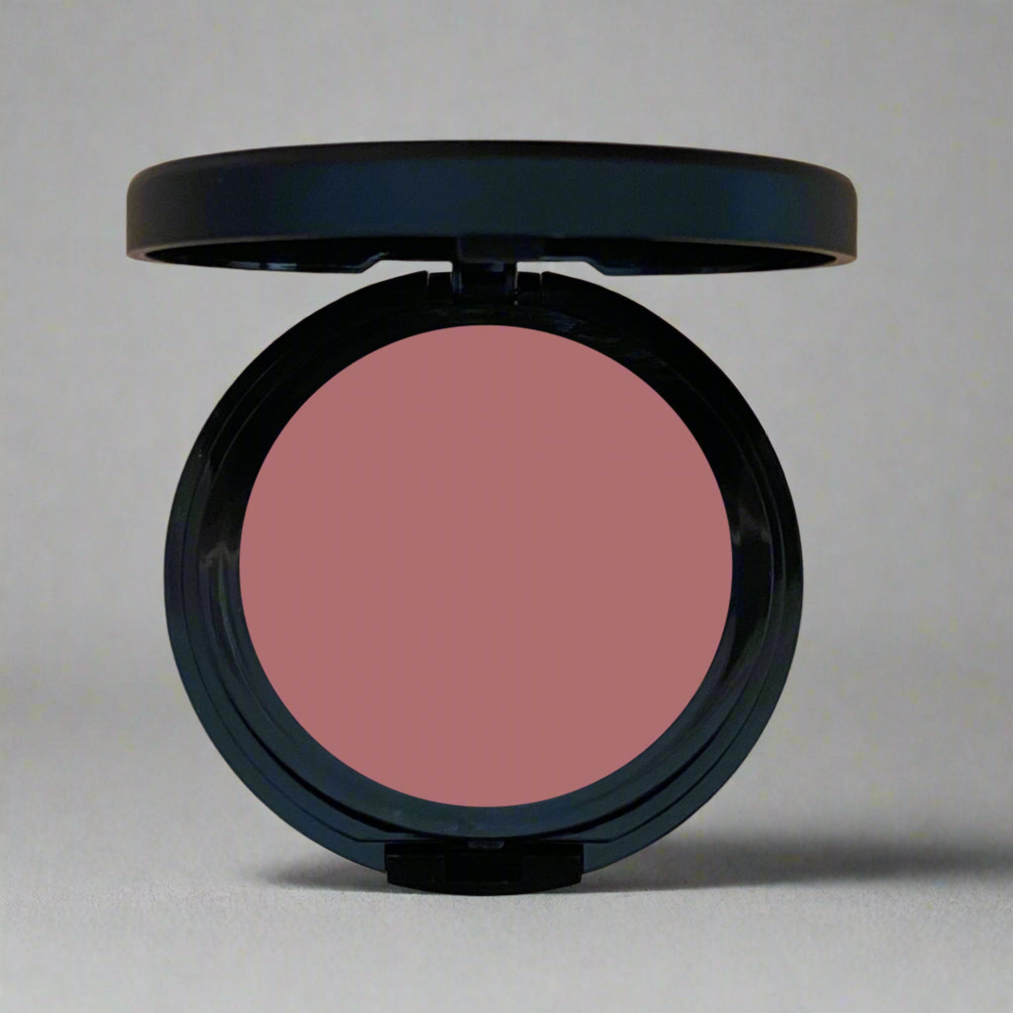 Tenderness Mauve Blush, a dusty mauve shade that adds a natural, soft warmth to your cheeks. Crafted with mindful, toxin-free ingredients, it enhances your complexion with a radiant and sustainable touch.